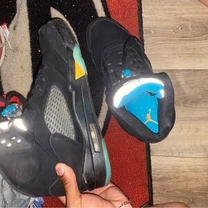 Black Sneakers with Blue and Yellow Accents